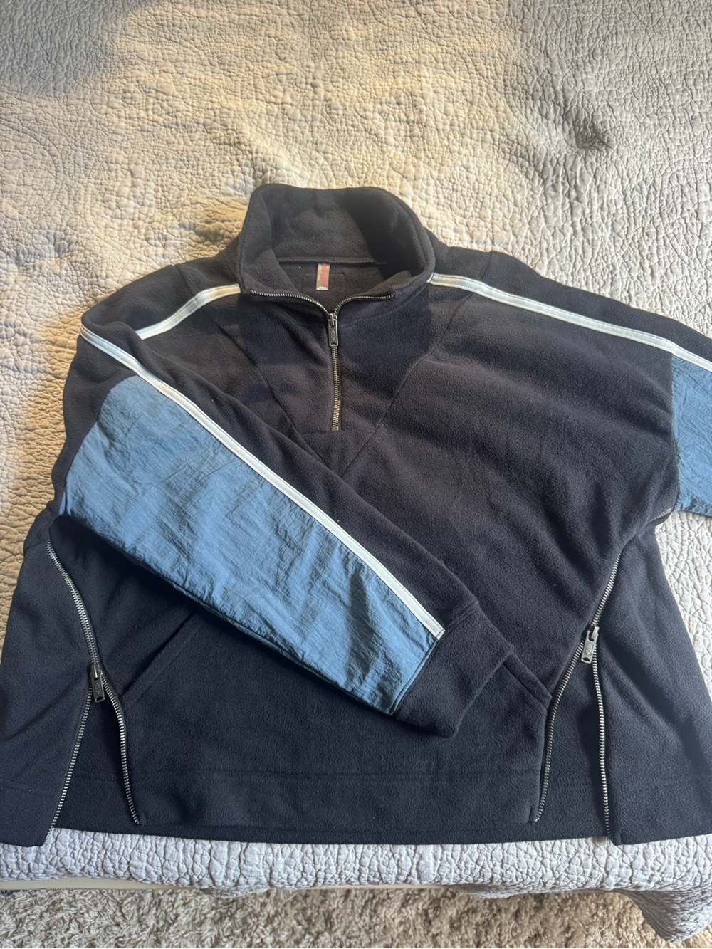 FREE PEOPLE quarter-zip with blue sleeves